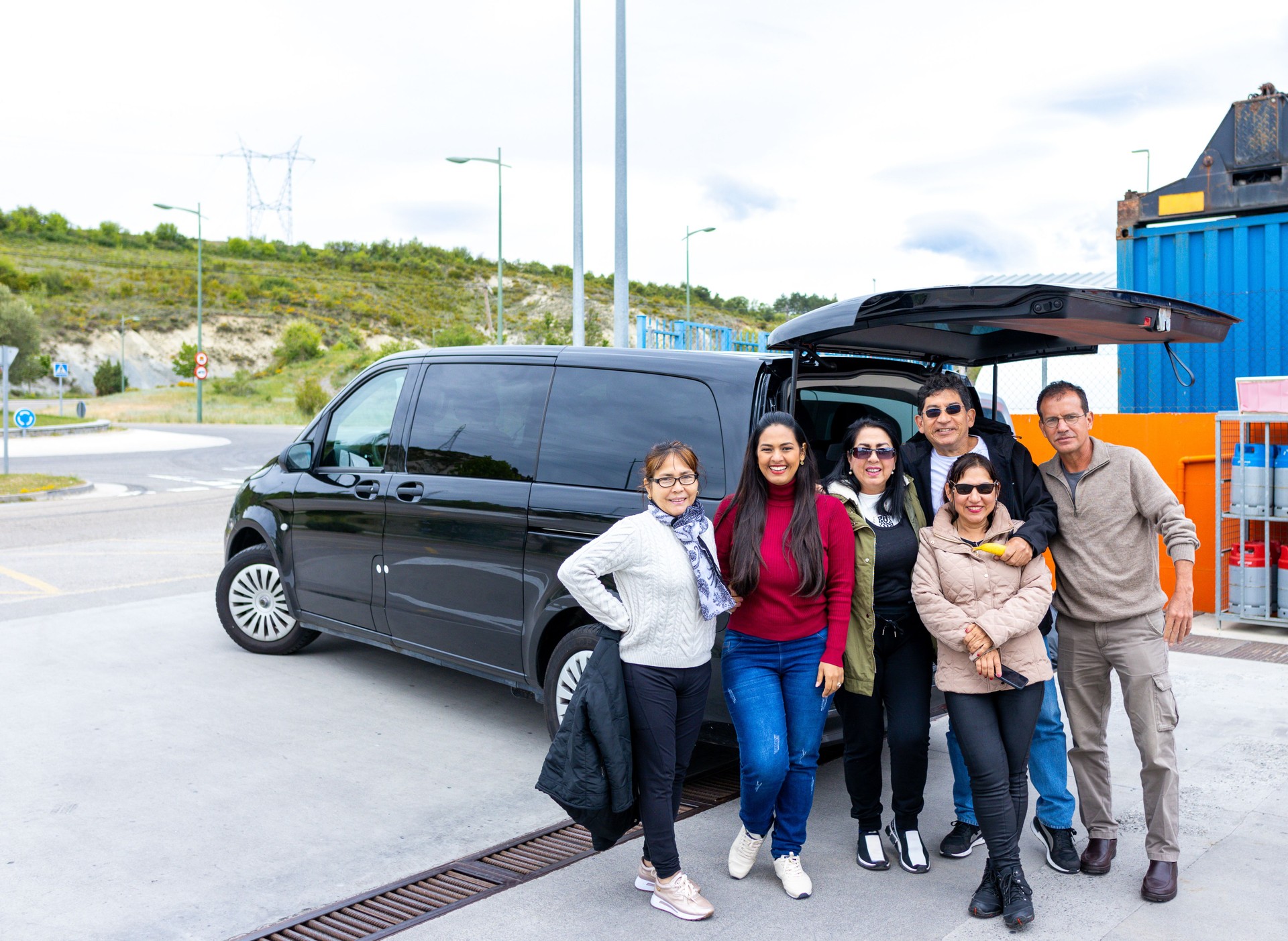 Spring vacation adventures with a joyful Latino family by their caravan in Spain